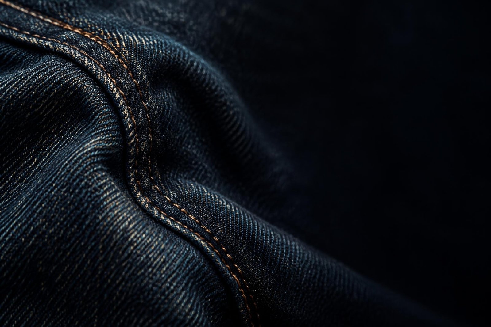 Close detail of premium indigo denim and stitching